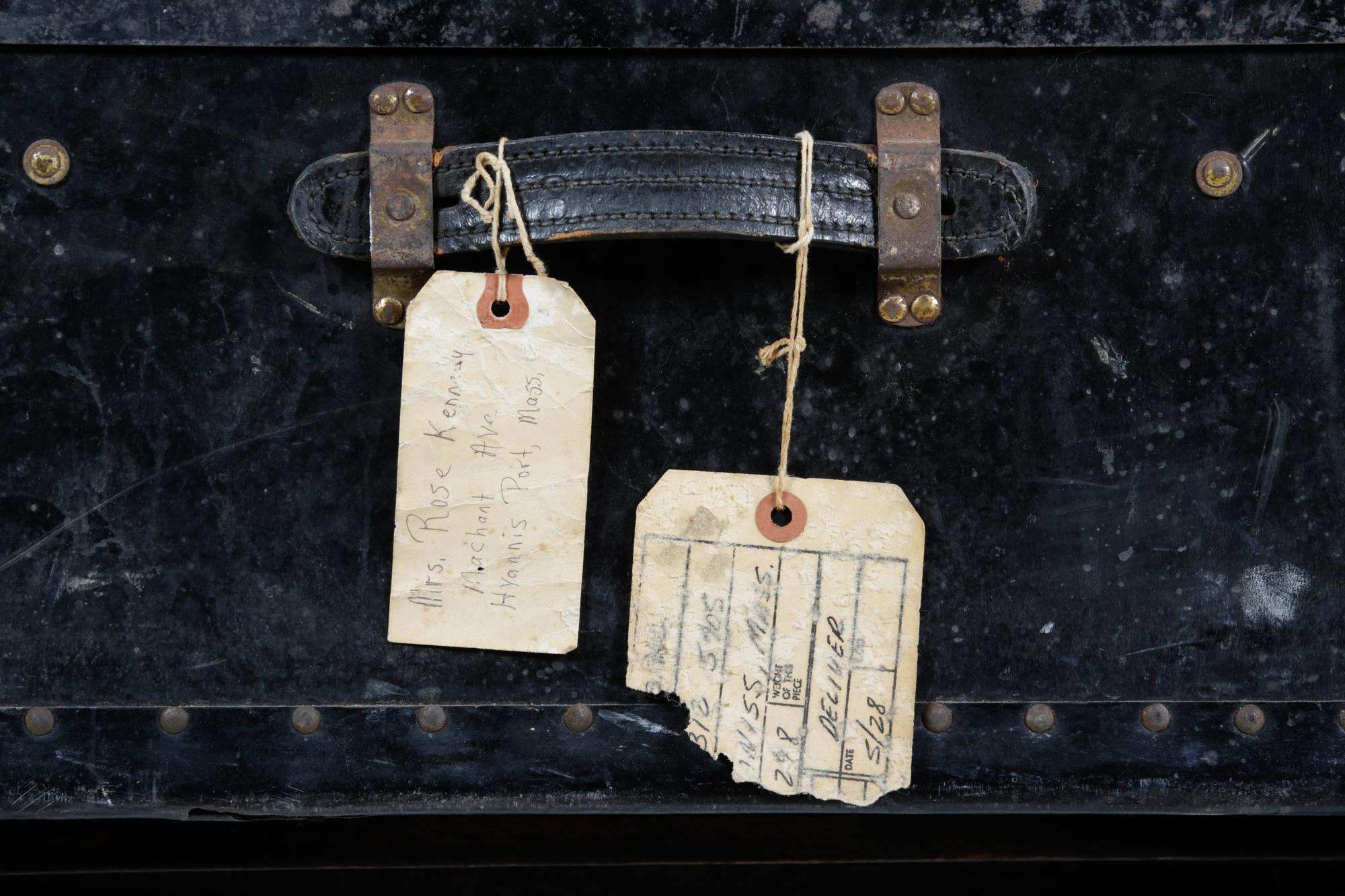 A Black Metal Steamer Trunk Height 12 1/2 inches x width 36 inches x depth 21 7/8 inches.