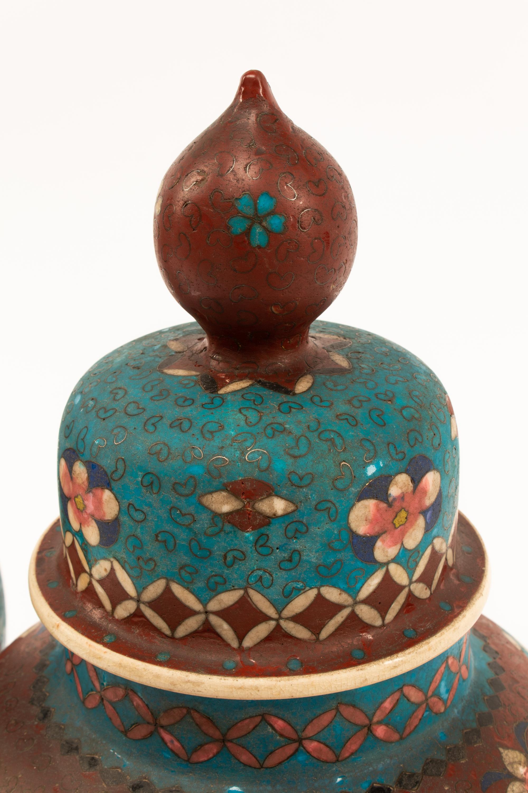 A Pair of Chinese Cloisonné over Porcelain Jars with Wood Bases