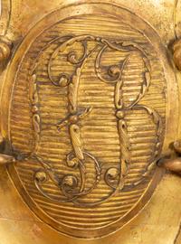 A Continental Carved Giltwood Cherub Wall Plaque