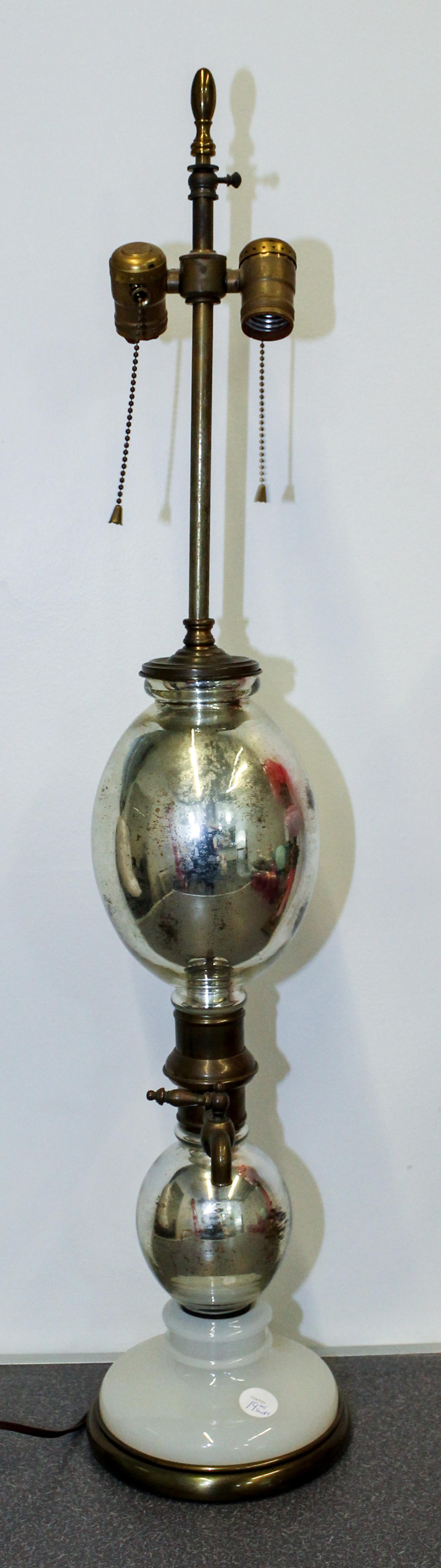 A Decorative Table Lamp. Height overall 35 1/2 inches.