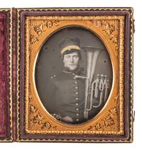 [EARLY PHOTOGRAPHY]. Sixth plate daguerreotype of uniformed bandsman holding a baritone saxhorn.