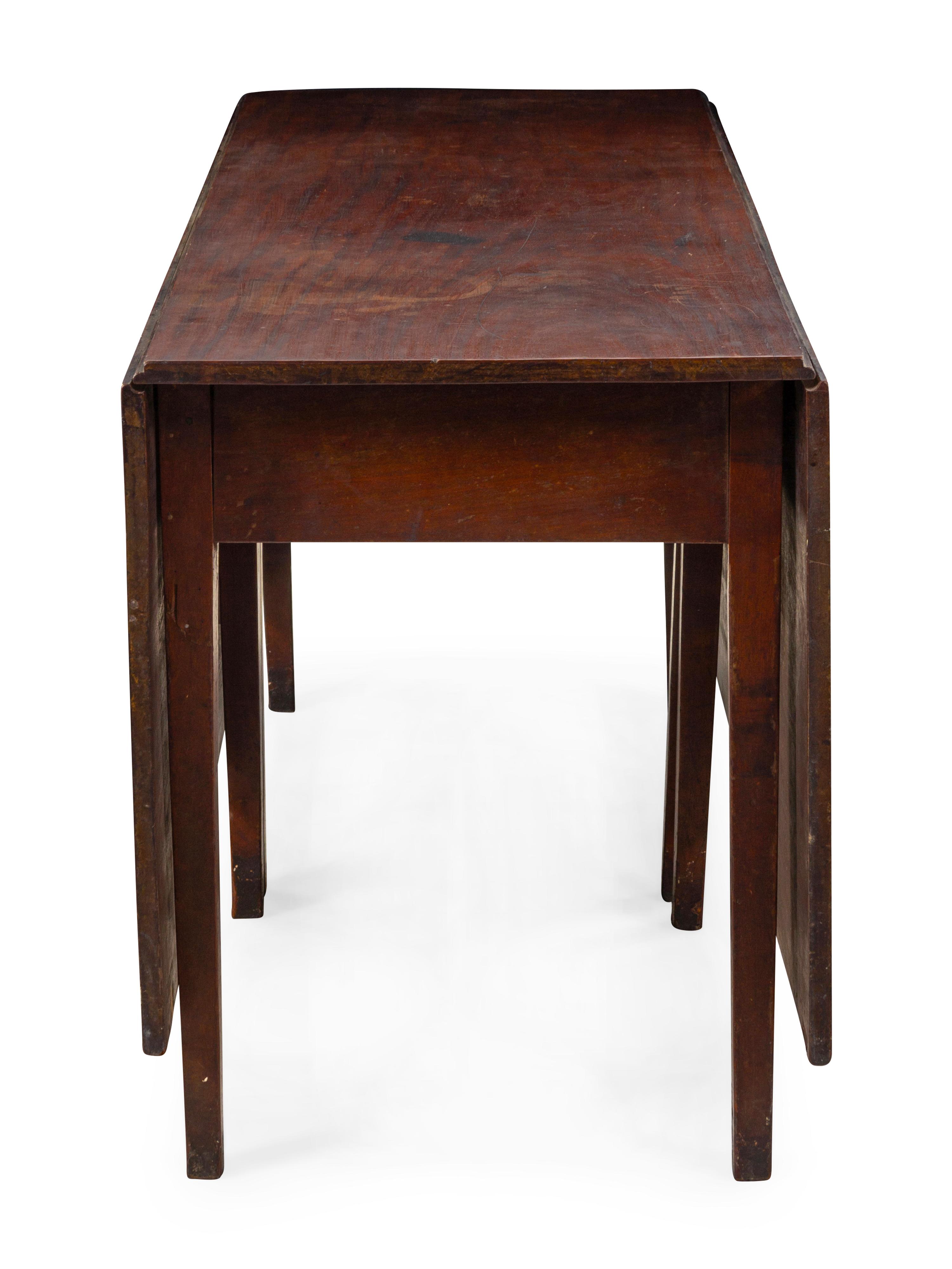 A Federal Mahogany Drop-Leaf Dining Table — Circa 1810