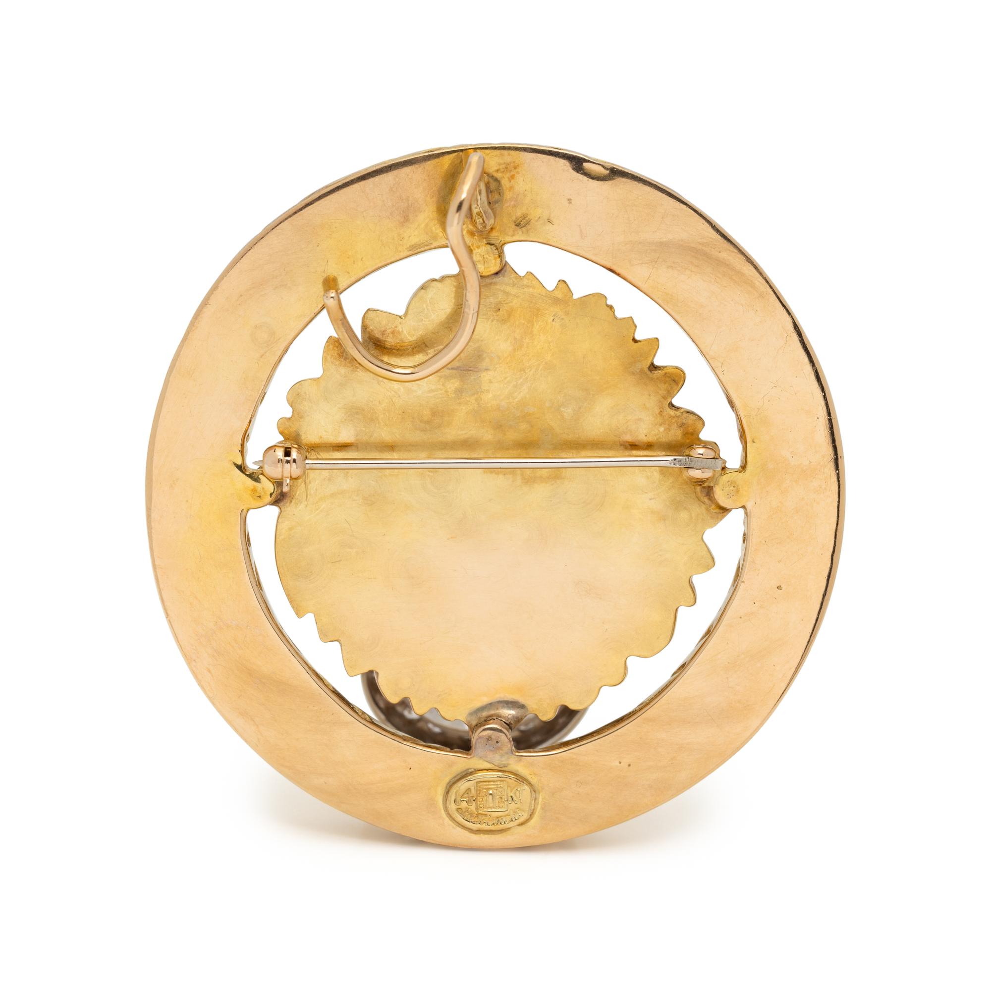 LA TRIOMPHE, YELLOW GOLD, DIAMOND AND EMERALD LION DOORKNOCKER PENDANT/BROOCH