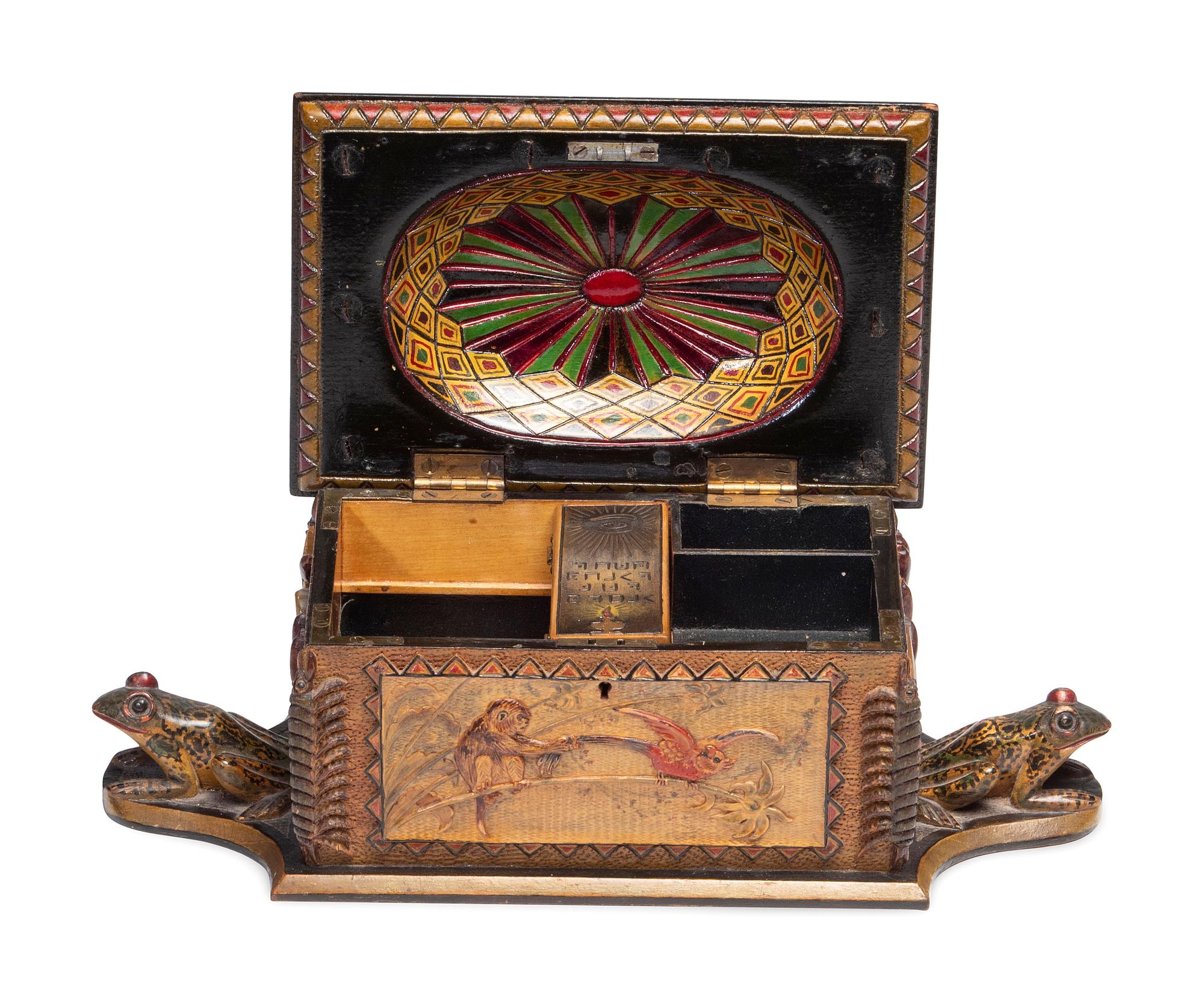 A Carved and Painted Wood Valuables Box with Masonic Interest