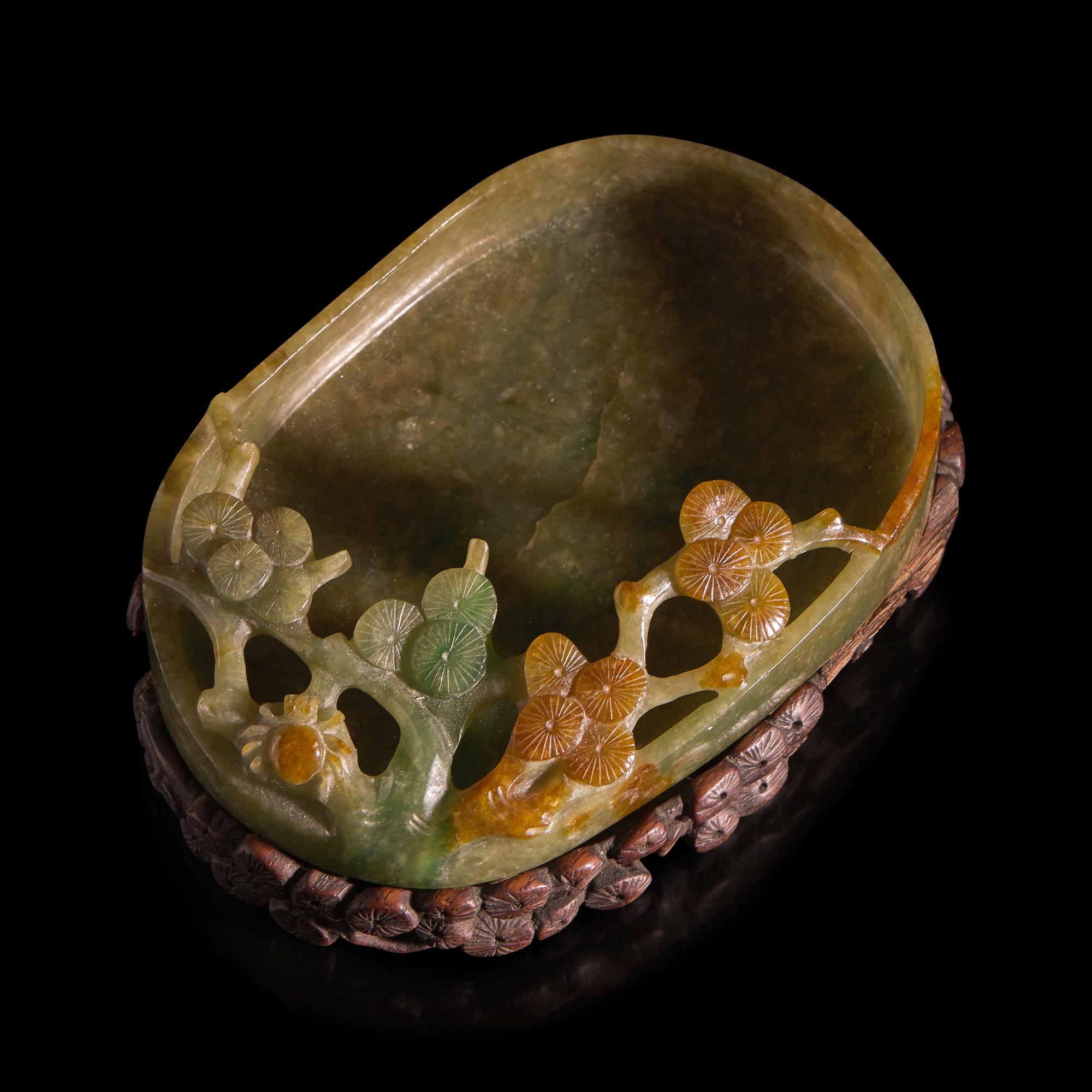 A Chinese Carved Jadeite "Pine and Spider" Brush Washer and Carved Wood Stand, Qing Dynasty — 清 翡翠鏤雕松紋洗