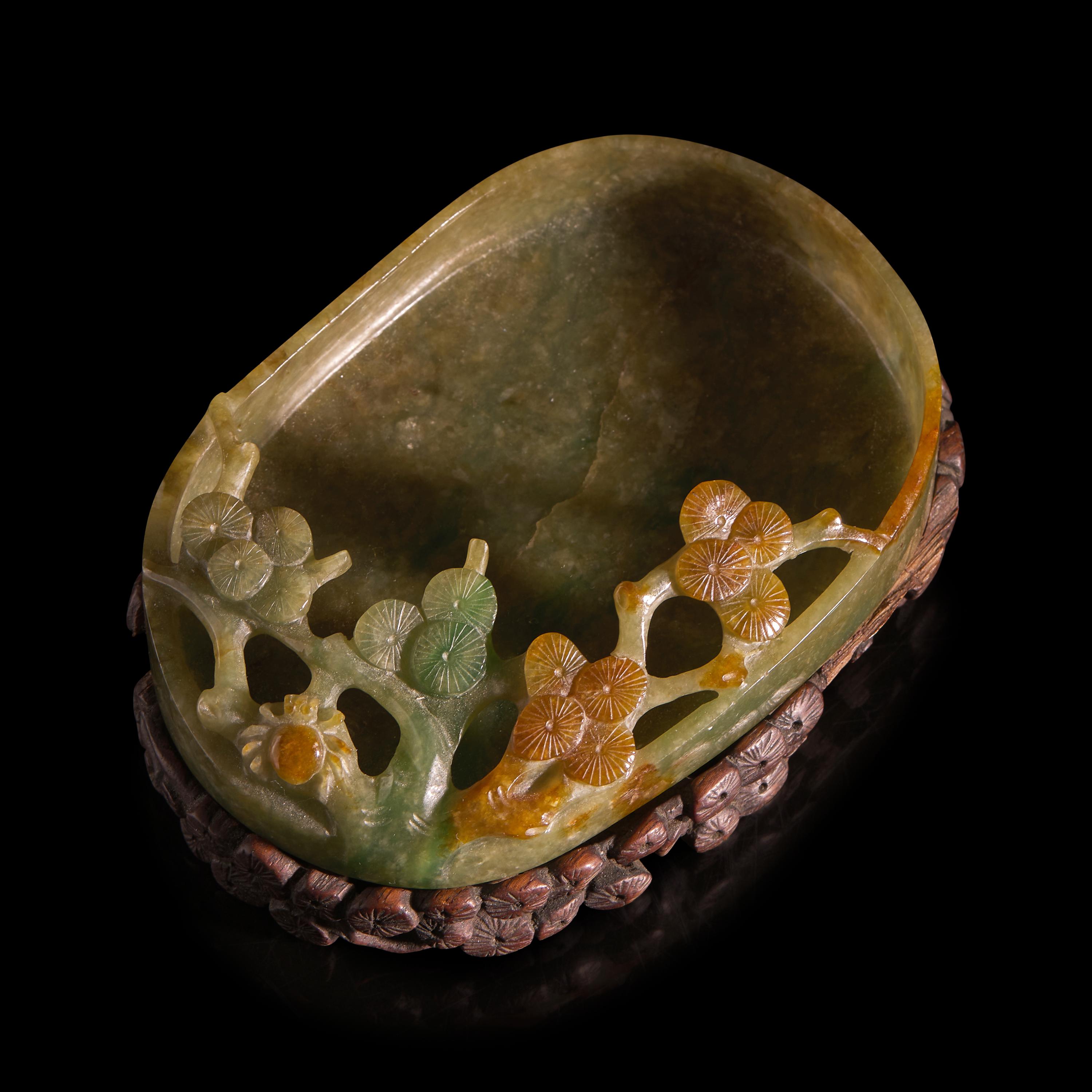 A Chinese Carved Jadeite "Pine and Spider" Brush Washer and Carved Wood Stand, Qing Dynasty — 清 翡翠鏤雕松紋洗