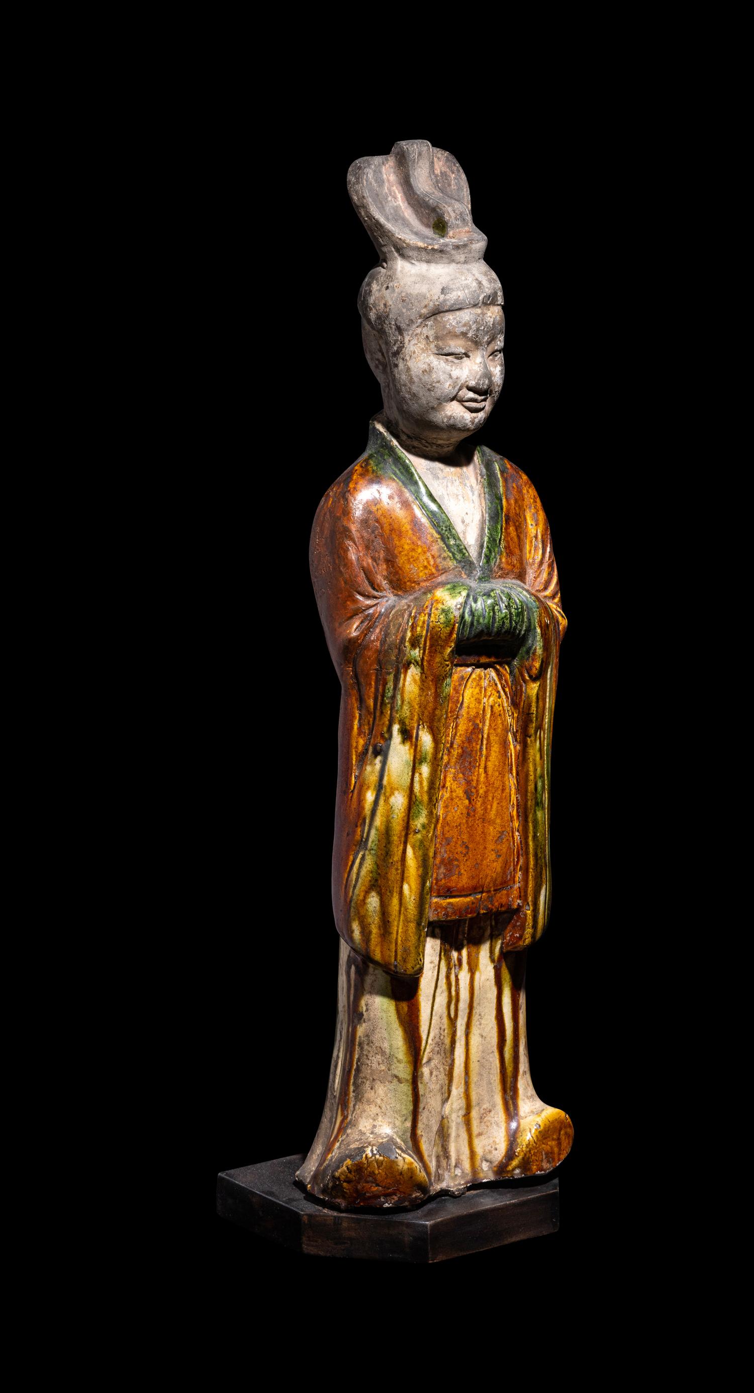 A Chinese Sancai Pottery Figure of a Standing Official