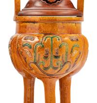 A Pair of Chinese Sancai Glazed Porcelain Tripod Ding Vessels