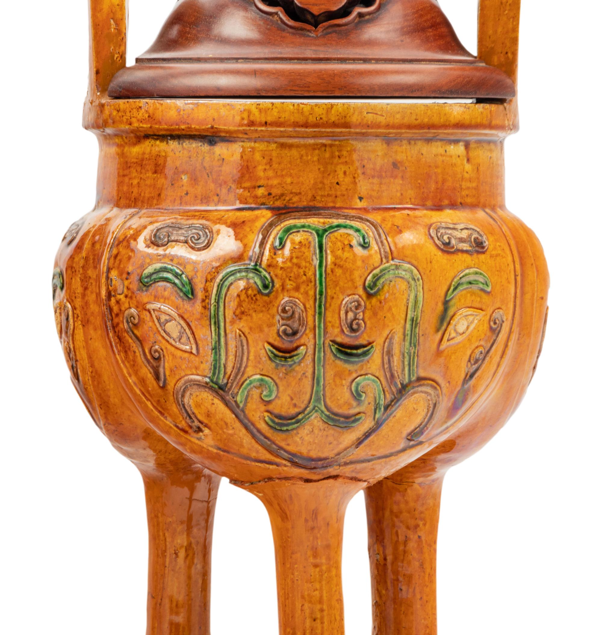 A Pair of Chinese Sancai Glazed Porcelain Tripod Ding Vessels