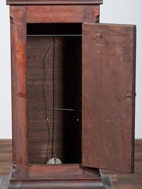 A Chippendale Cherrywood and Tiger Maple Tall Case Clock