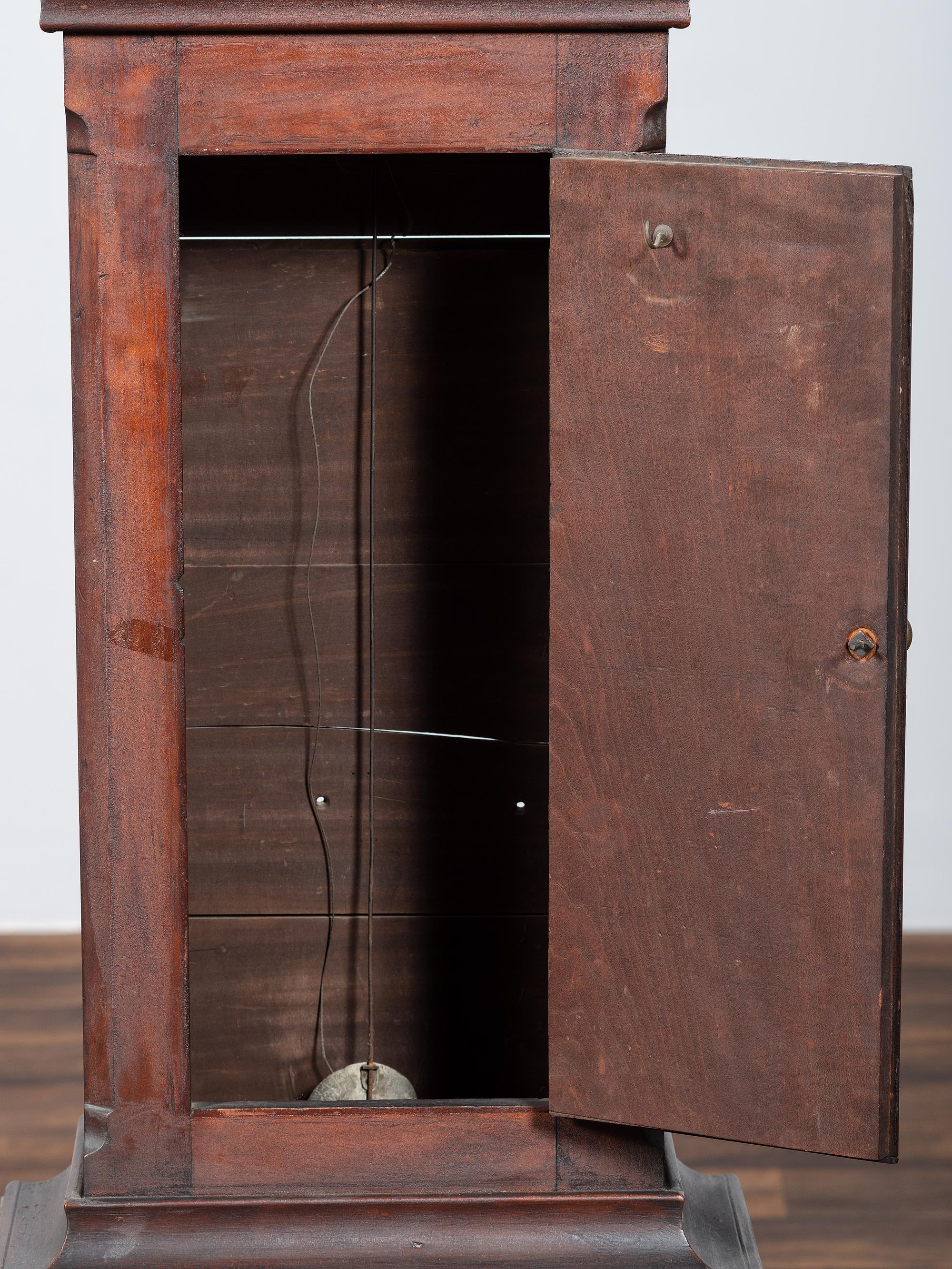 A Chippendale Cherrywood and Tiger Maple Tall Case Clock