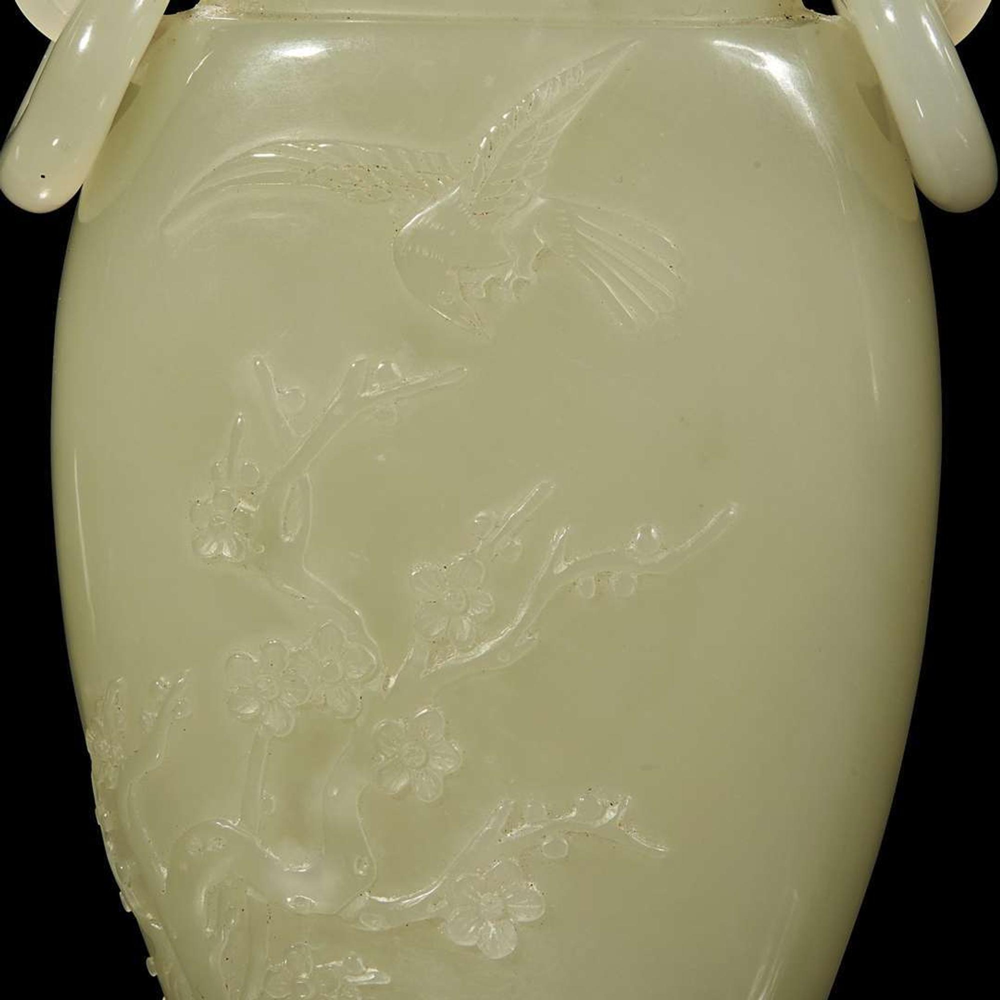 A Chinese pale celadon jade hanging vase and wood stand 白玉吊瓶