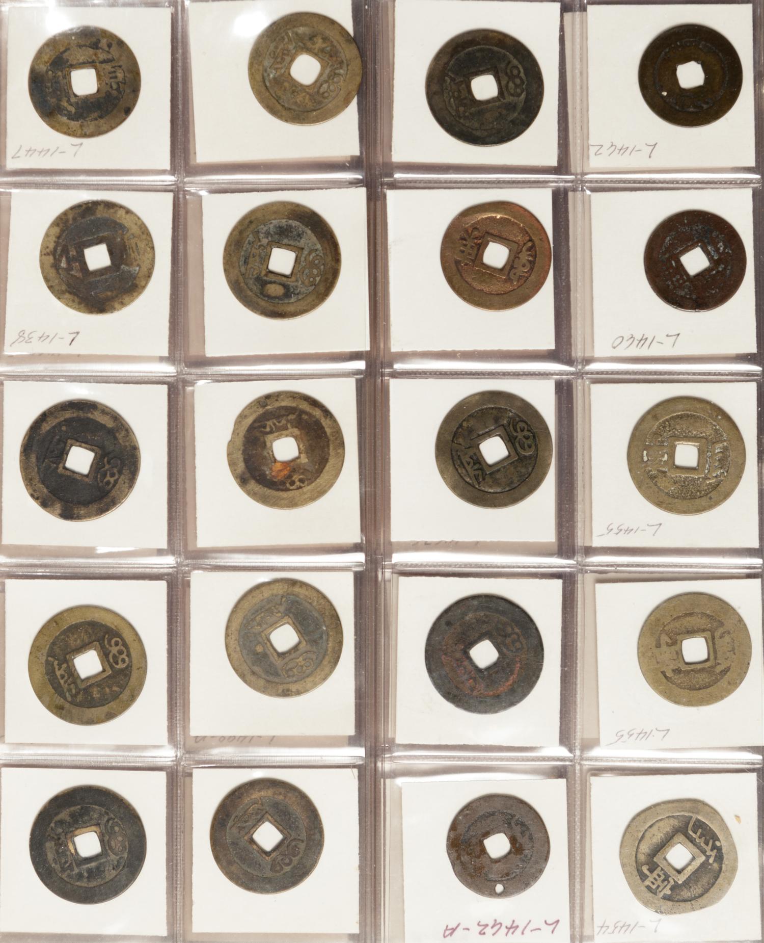 A Large Collection of Chinese Coins and Pendants