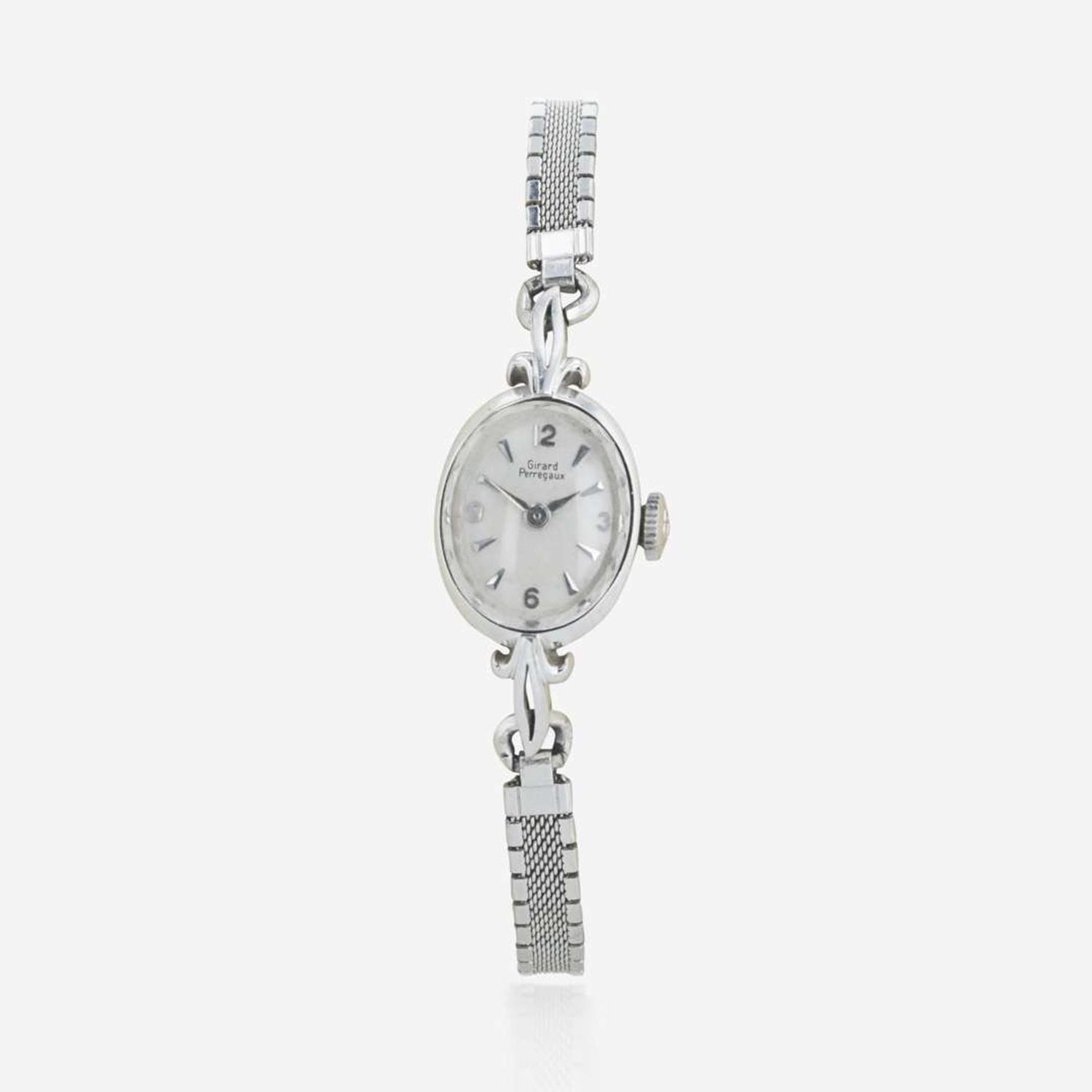 Two lady's watches and earrings