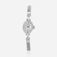 Two lady's watches and earrings