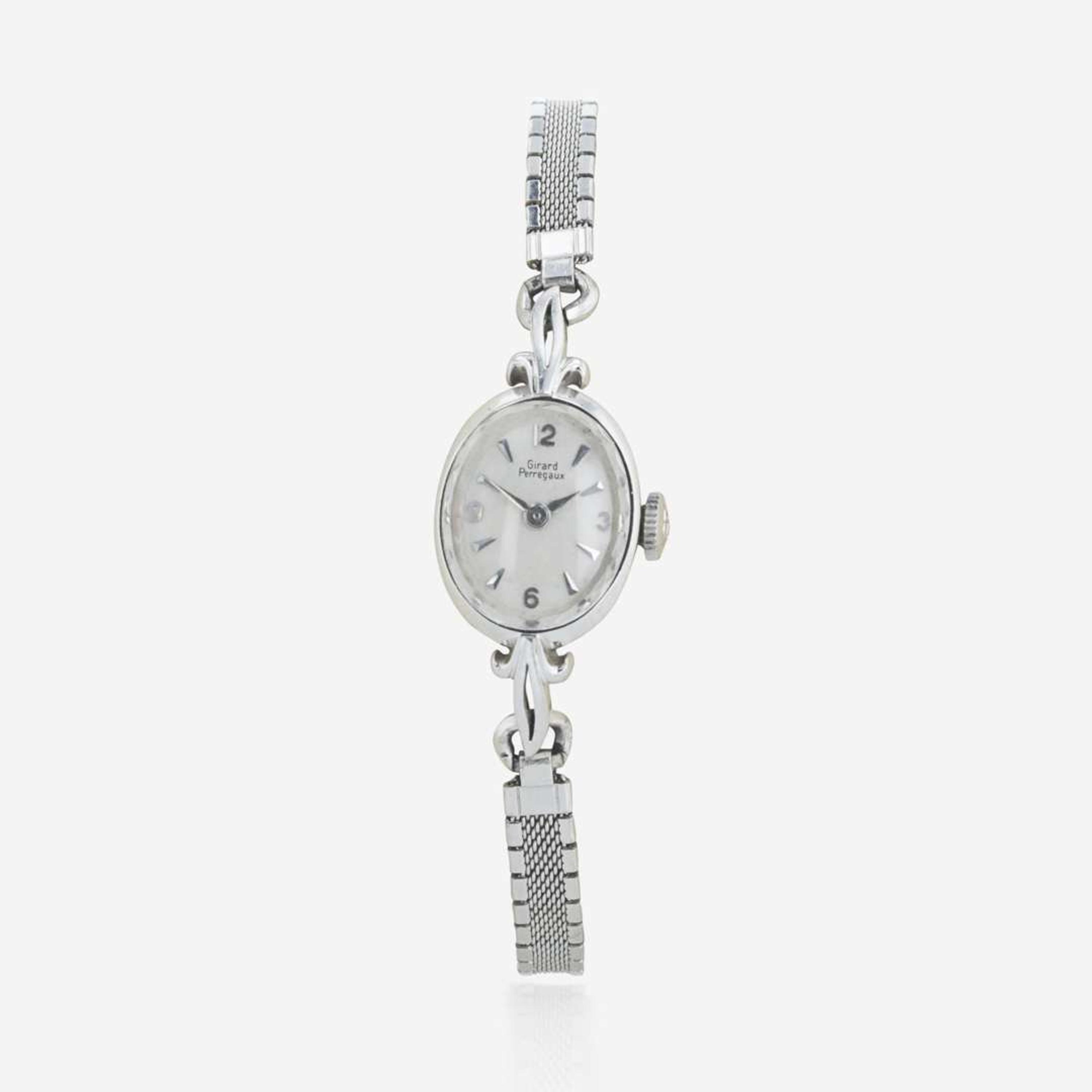 Two lady's watches and earrings