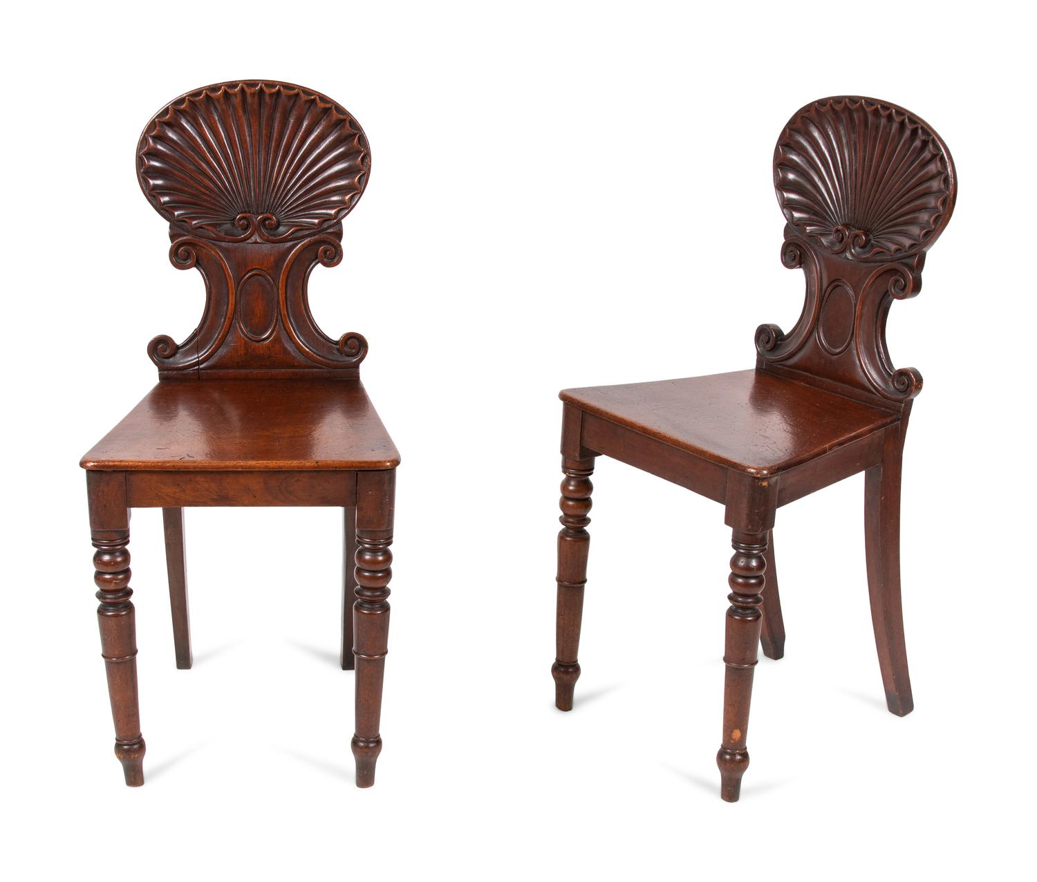A Pair of Regency Style Mahogany Hall Chairs