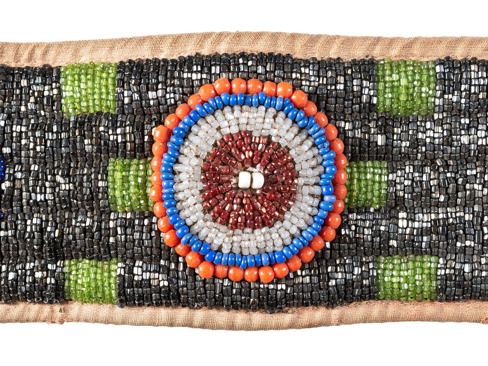 Collection of Plateau Belts, Gauntlets, and Armbands