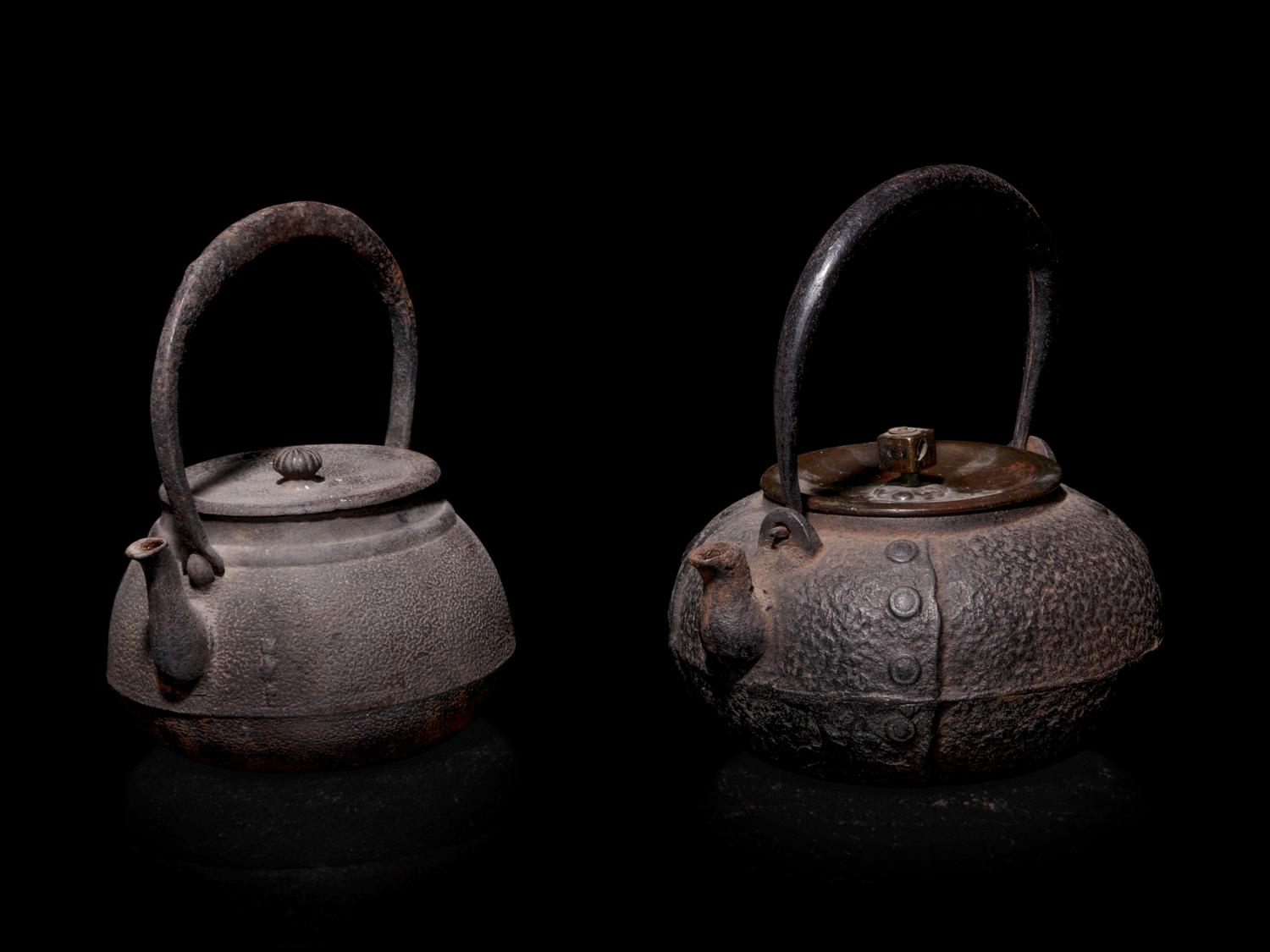 Seven Japanese Cast Iron Teapots, Tetsubin, and Burner
