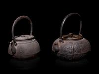 Seven Japanese Cast Iron Teapots, Tetsubin, and Burner