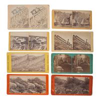 [EARLY PHOTOGRAPHY] -- [RAILROADS]. A group of stereoviews, albumen photographs, and other photographs related to railroads, comprising: