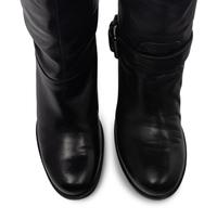 Two Pairs of Boots by Christian Louboutin and Prada Sport