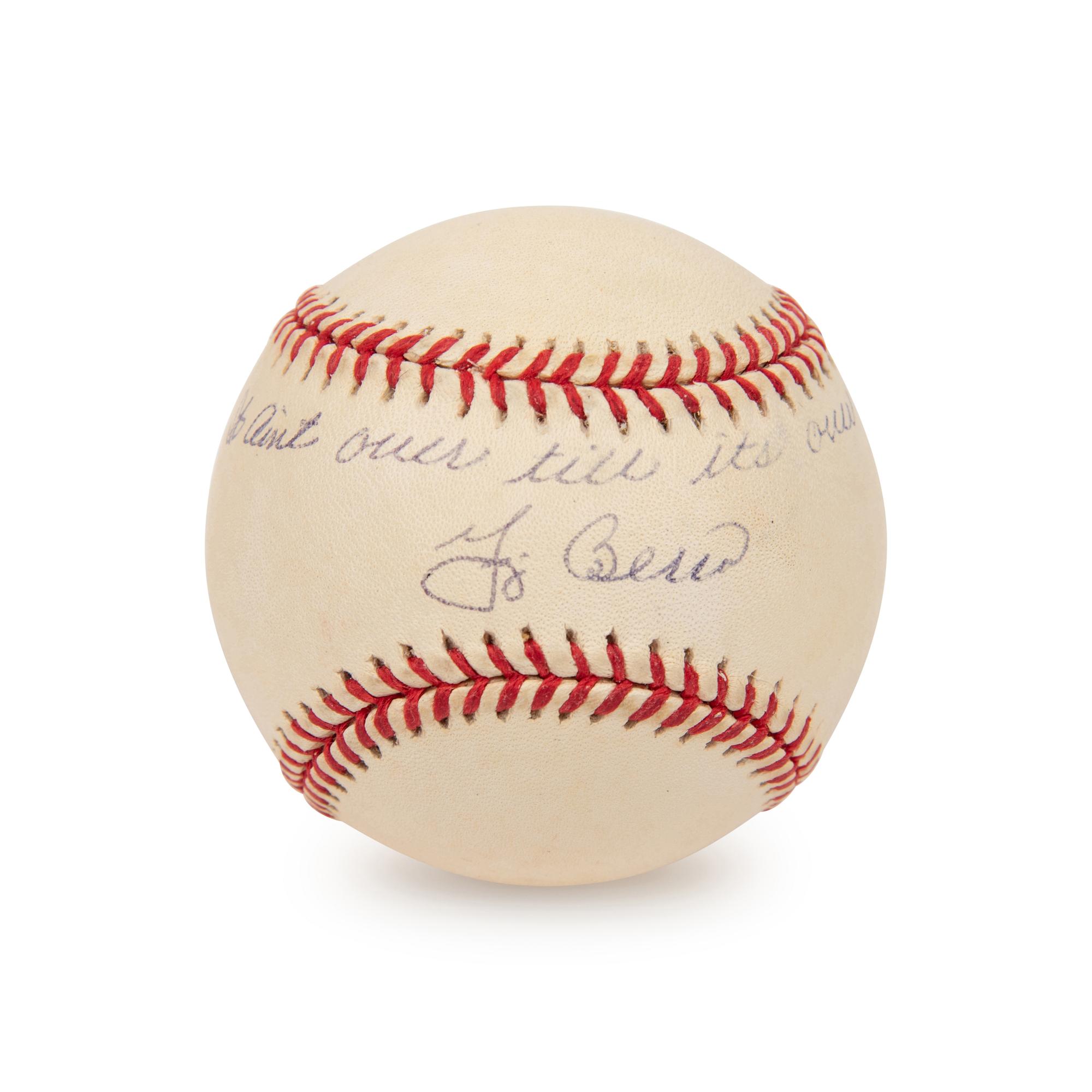 A Yogi Berra Single Signed Baseball Inscribed "It Ain't Over Till It's Over"