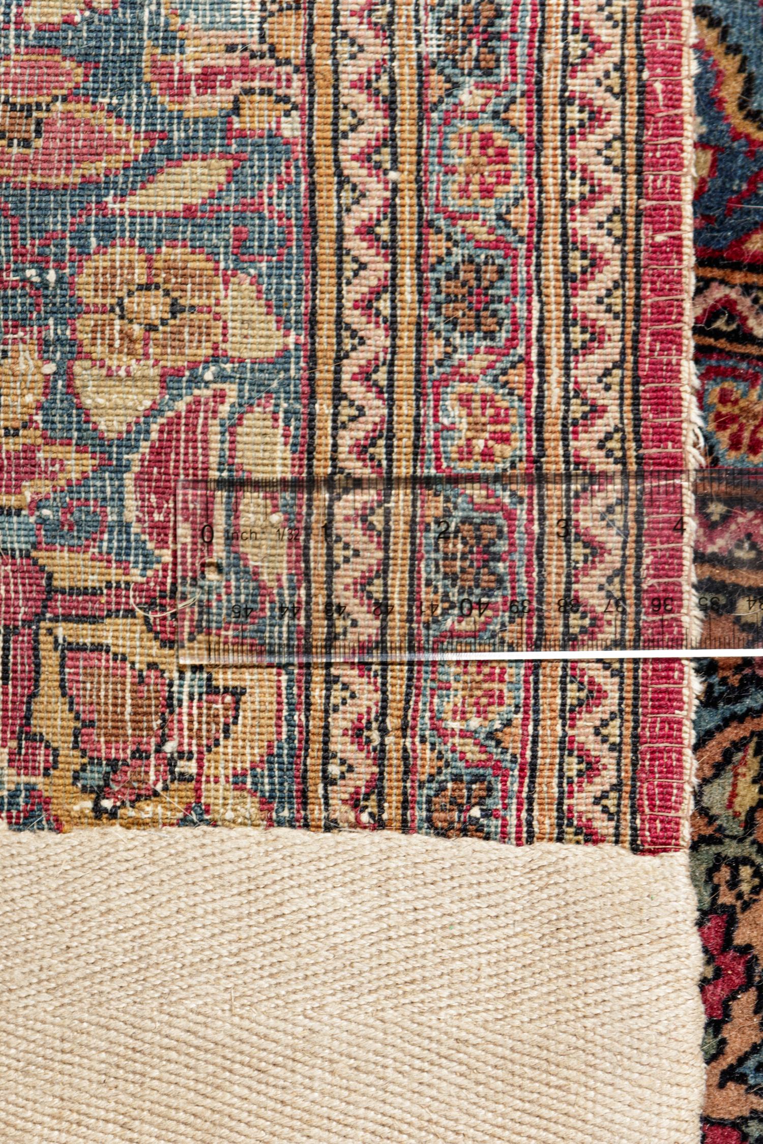 A Kirman Wool Rug