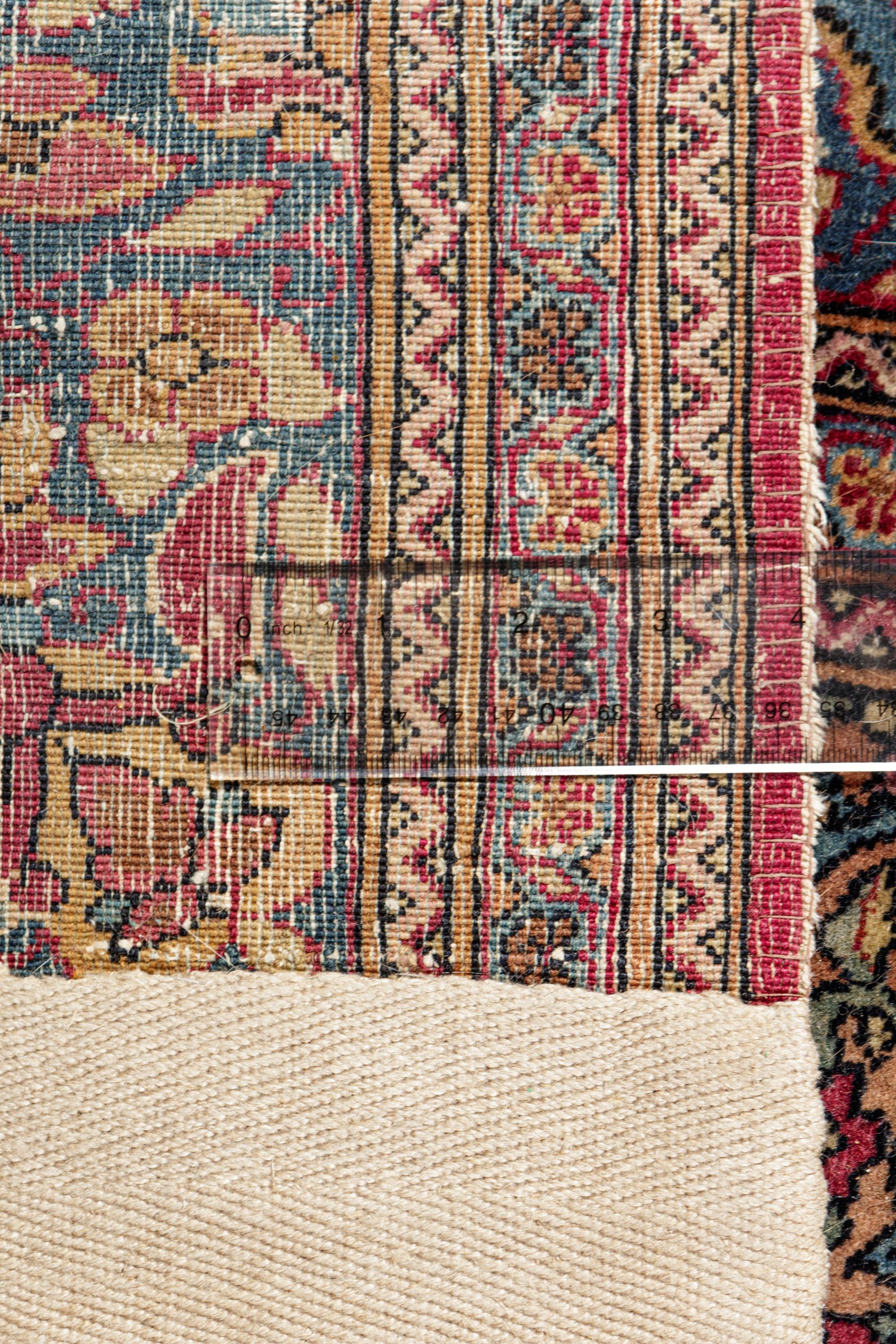 A Kirman Wool Rug
