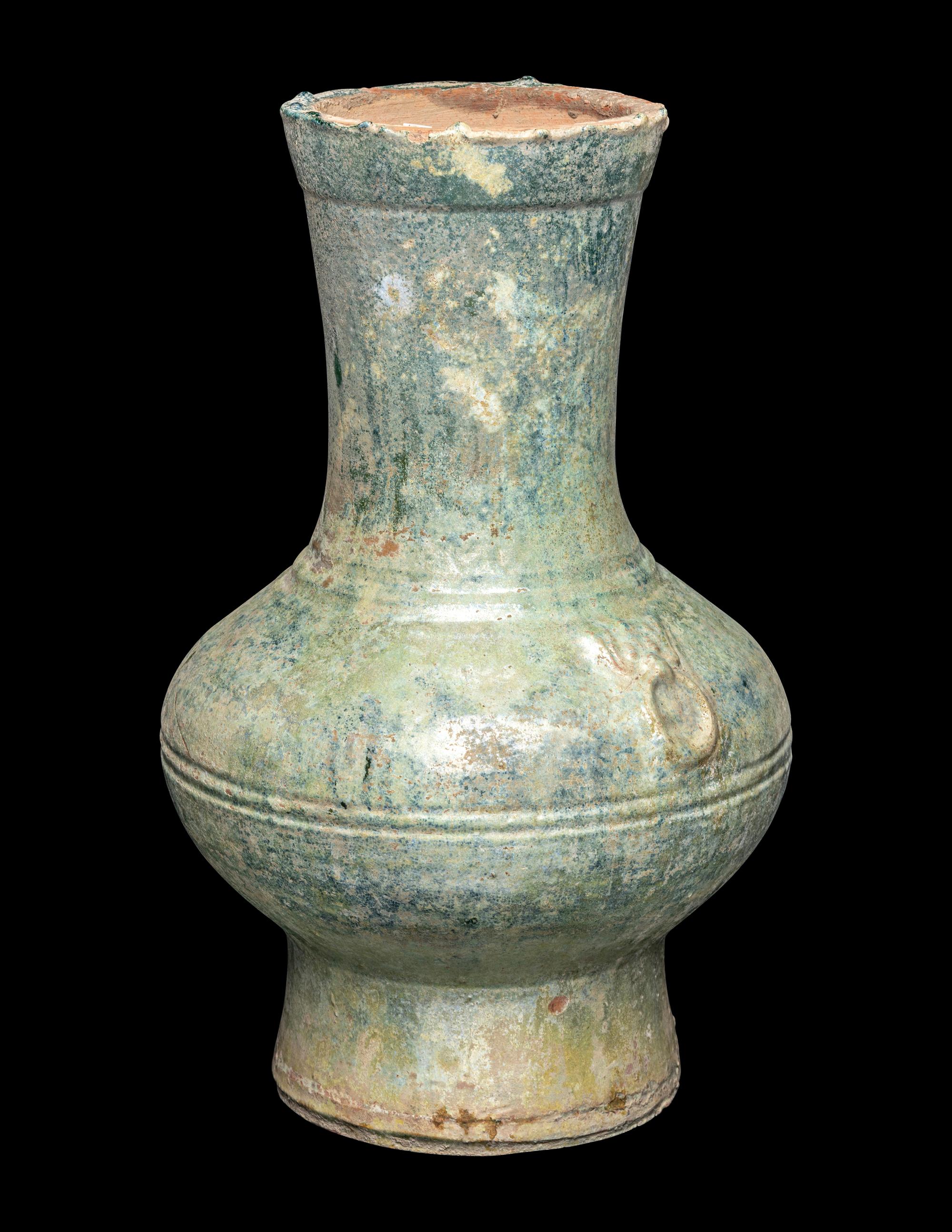 A Chinese Green Glazed Pottery Hu Vase