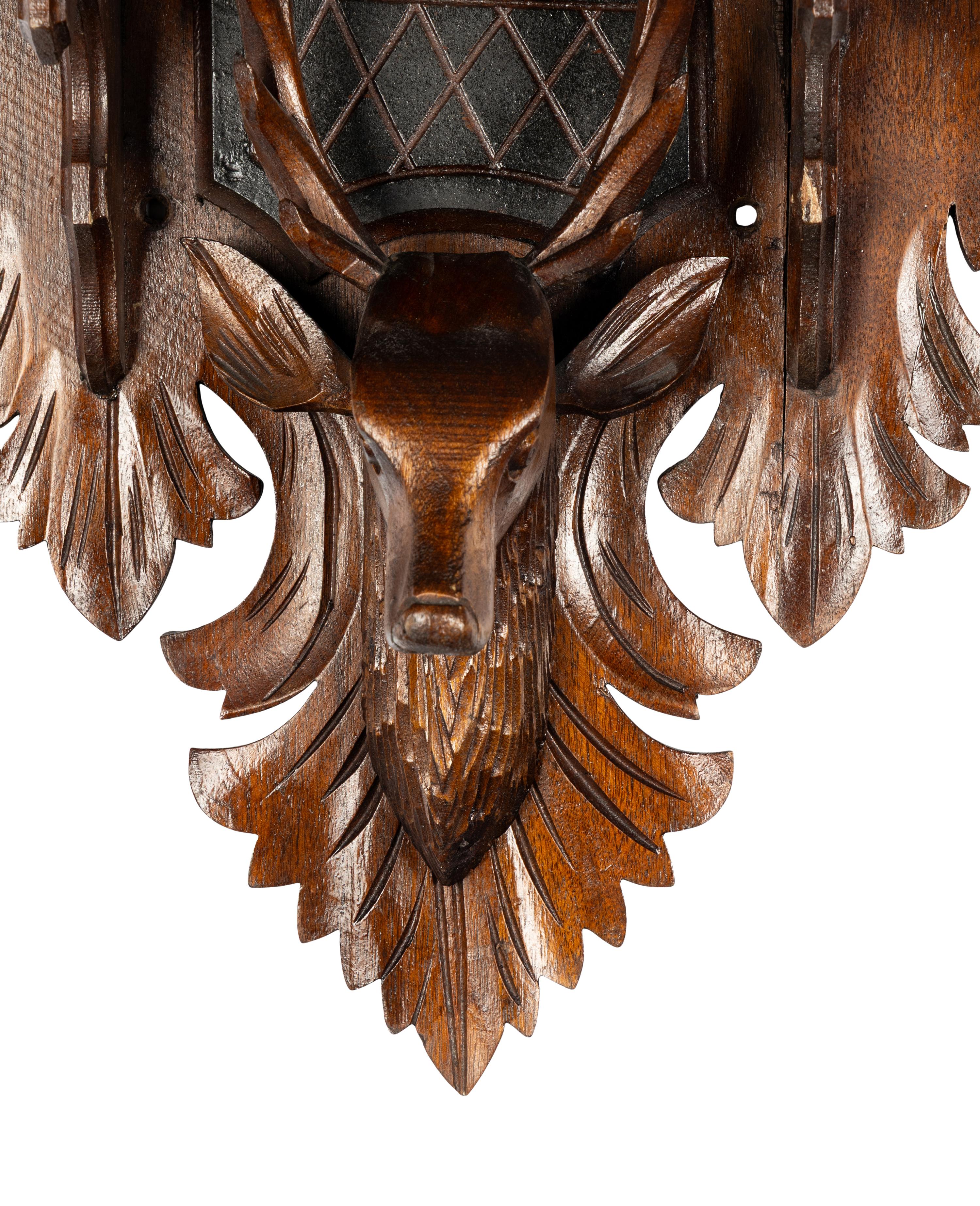 A Pair of Carved Wood Stag Wall Brackets