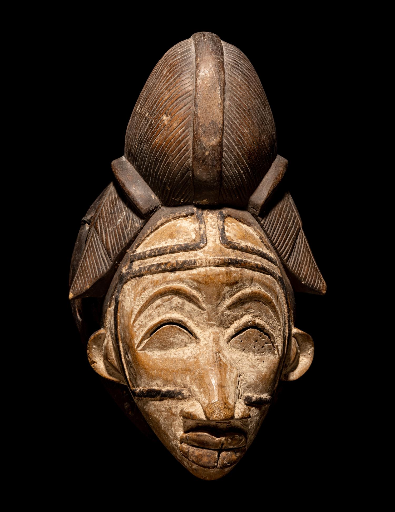 Four Punu Wood Masks
