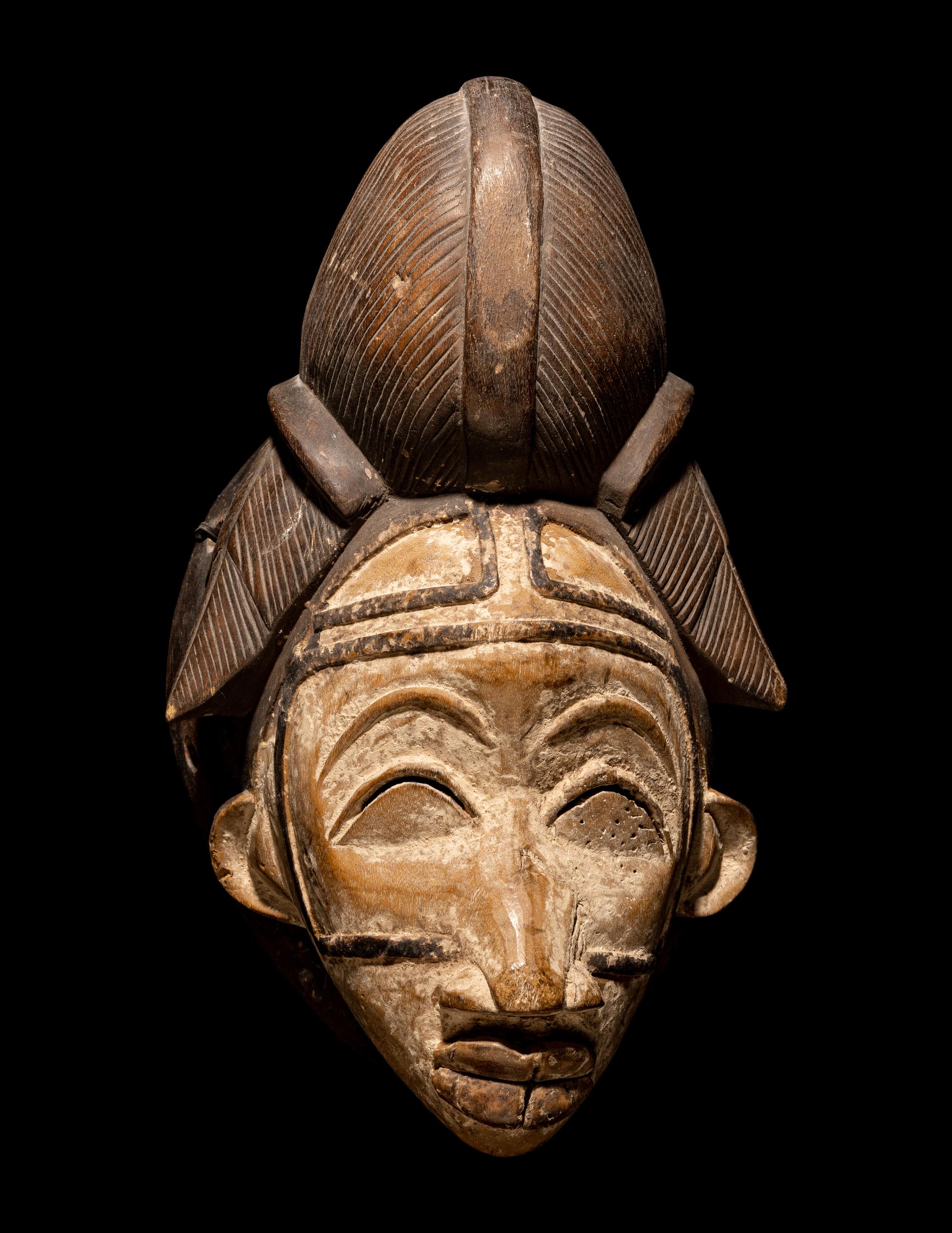 Four Punu Wood Masks