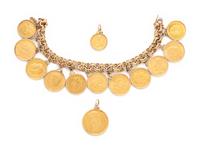 YELLOW GOLD AND COIN CHARM BRACELET