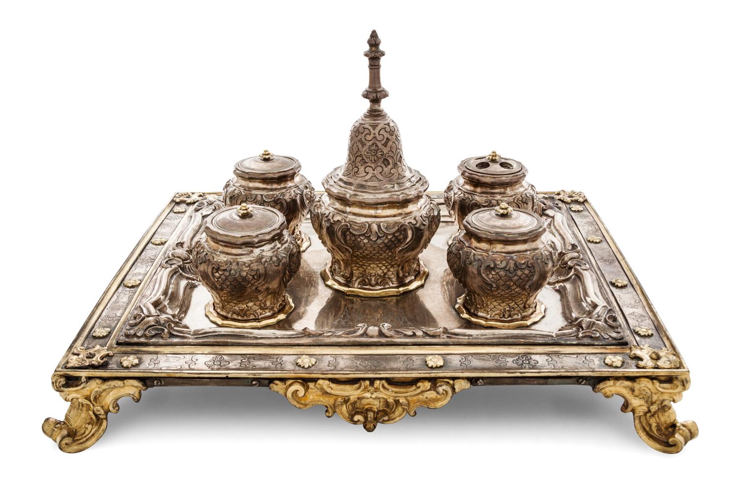 An Italian Silver and Silver-Gilt Standish, Mark of Geronimo di Benedetto, Naples, 1733, rectangular, fitted for five jars, the center