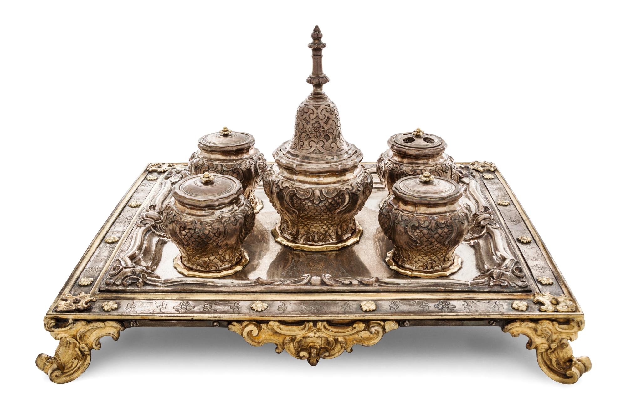An Italian Silver and Silver-Gilt Standish, Mark of Geronimo di Benedetto, Naples, 1733, rectangular, fitted for five jars, the center