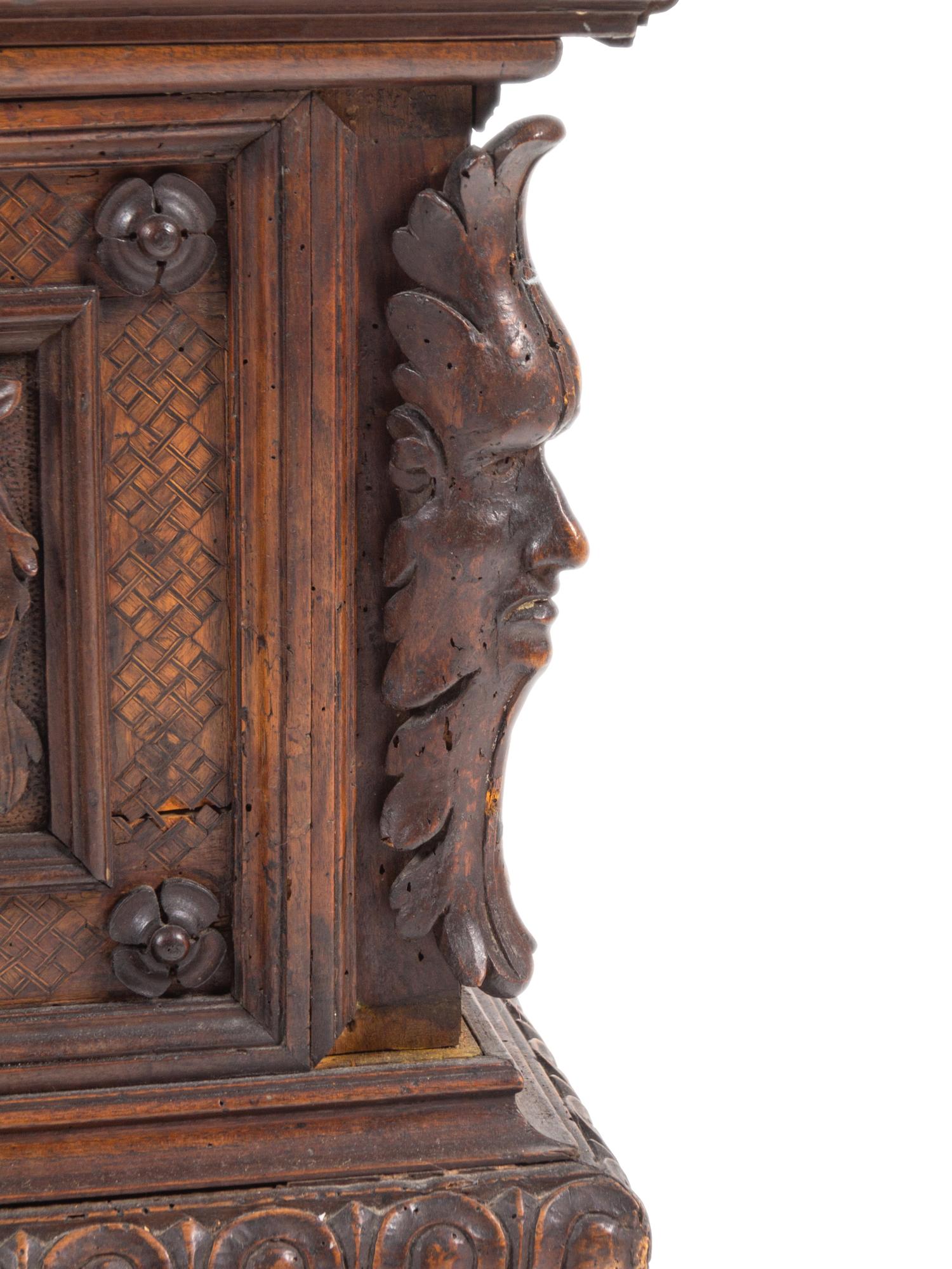 A Continental Carved Walnut Cassone