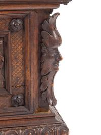 A Continental Carved Walnut Cassone