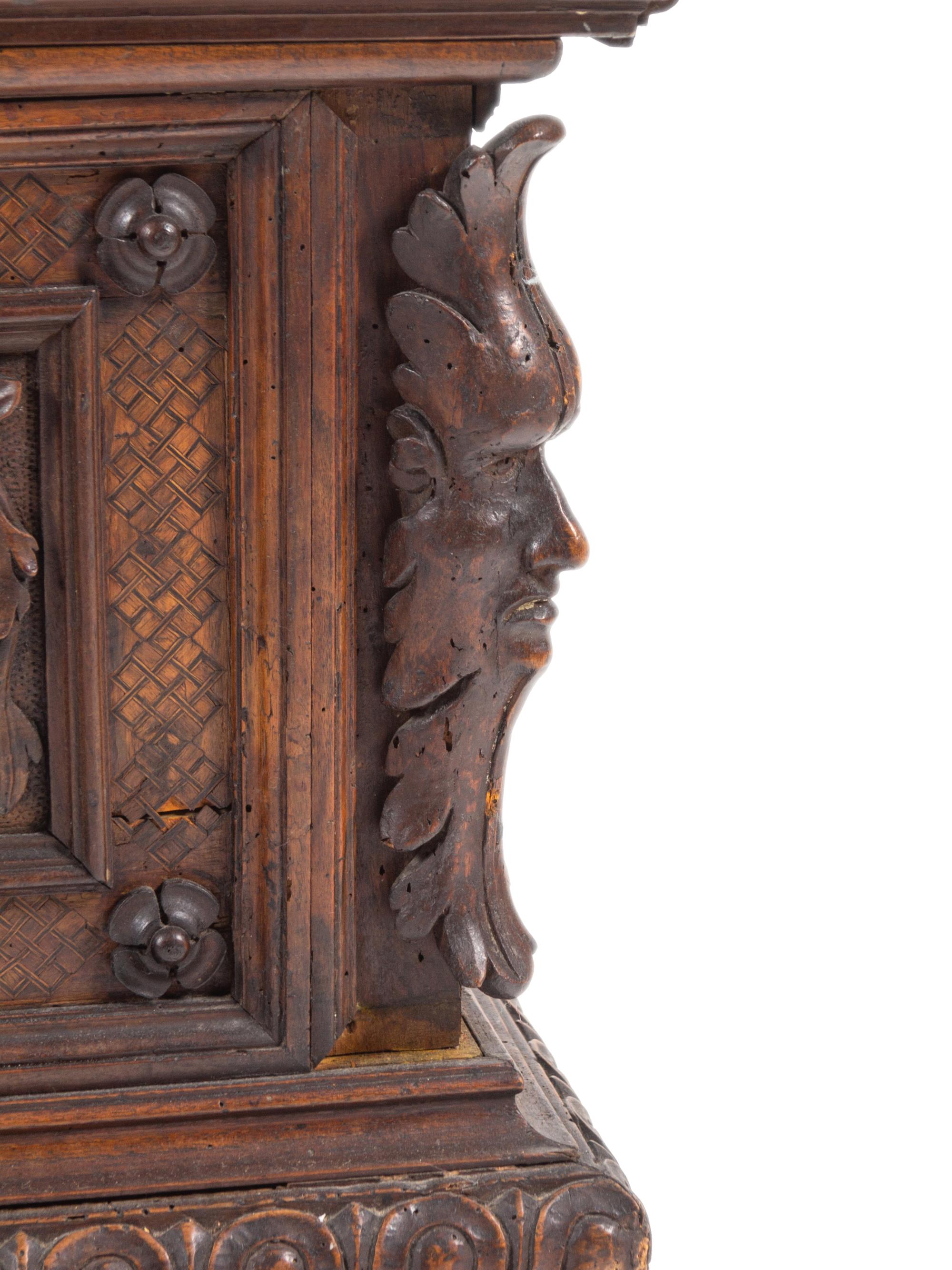 A Continental Carved Walnut Cassone