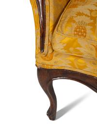A Louis XV Provincial Carved Walnut Settee
