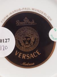 A Group of Versace Medusa Porcelain Table Articles