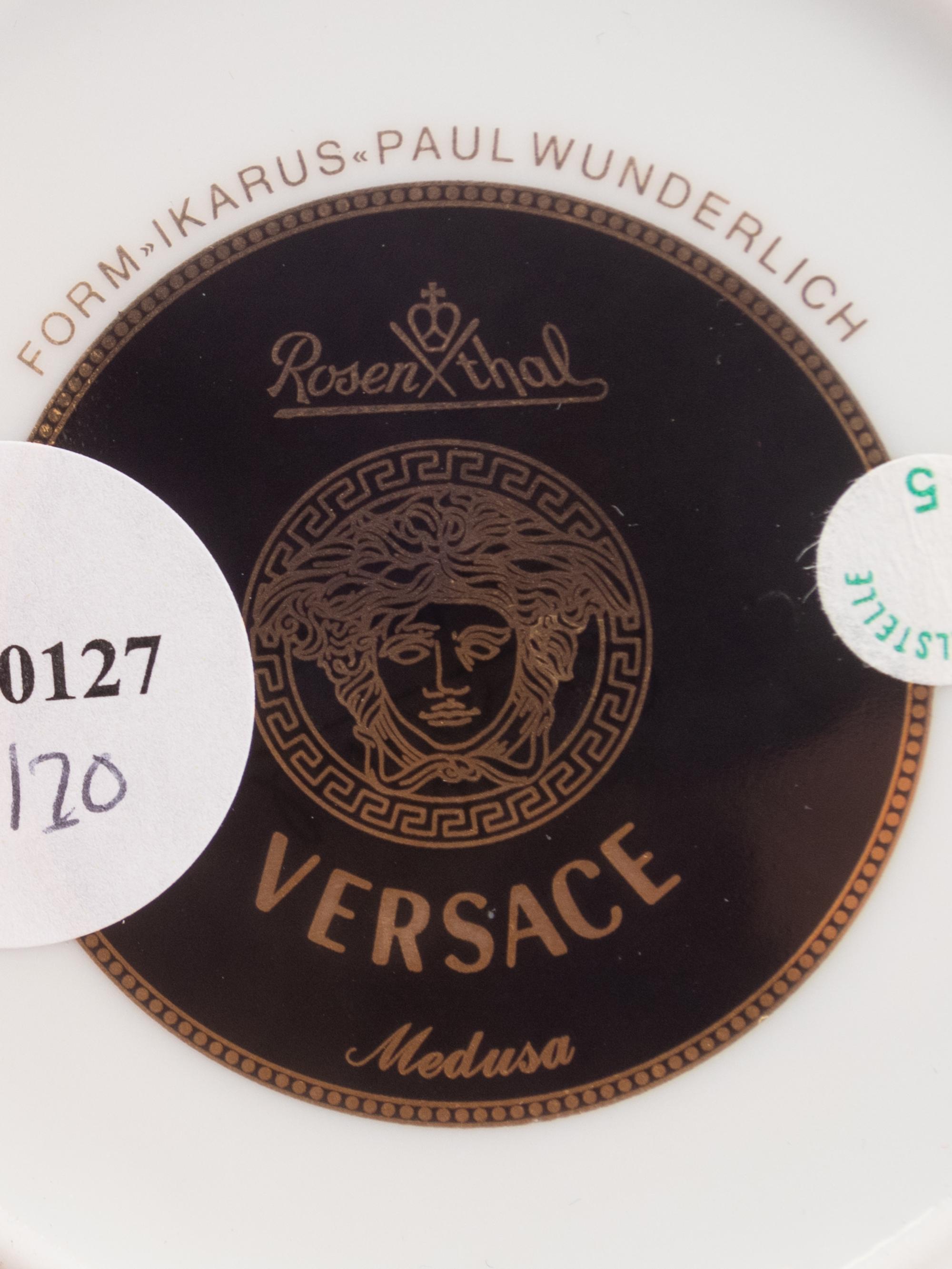 A Group of Versace Medusa Porcelain Table Articles
