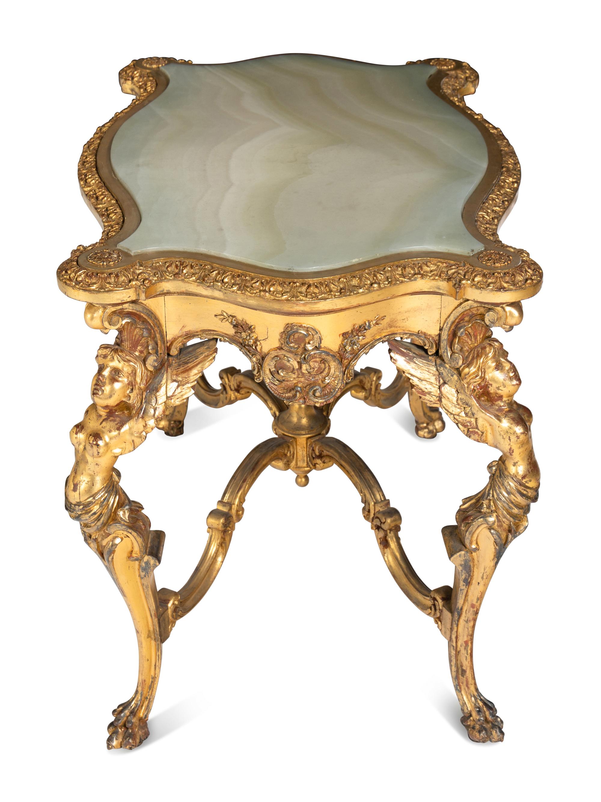 A Continental Rococo Style Giltwood Onyx-Top Table
