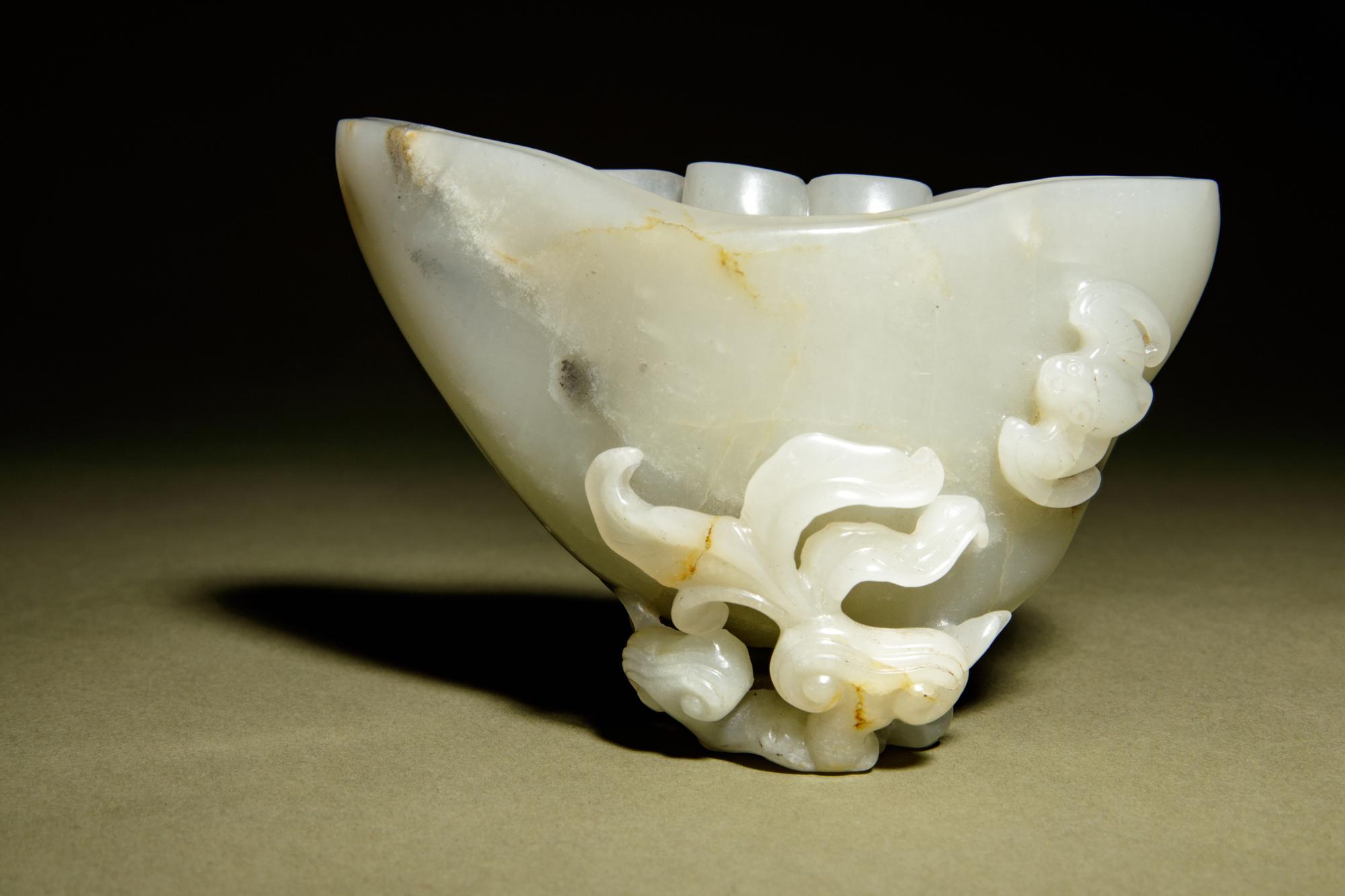 A Grey and Pale Celadon Jade Libation Cup