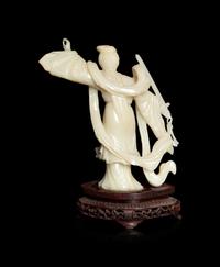 A Chinese Jade Figure of a Female Immortal