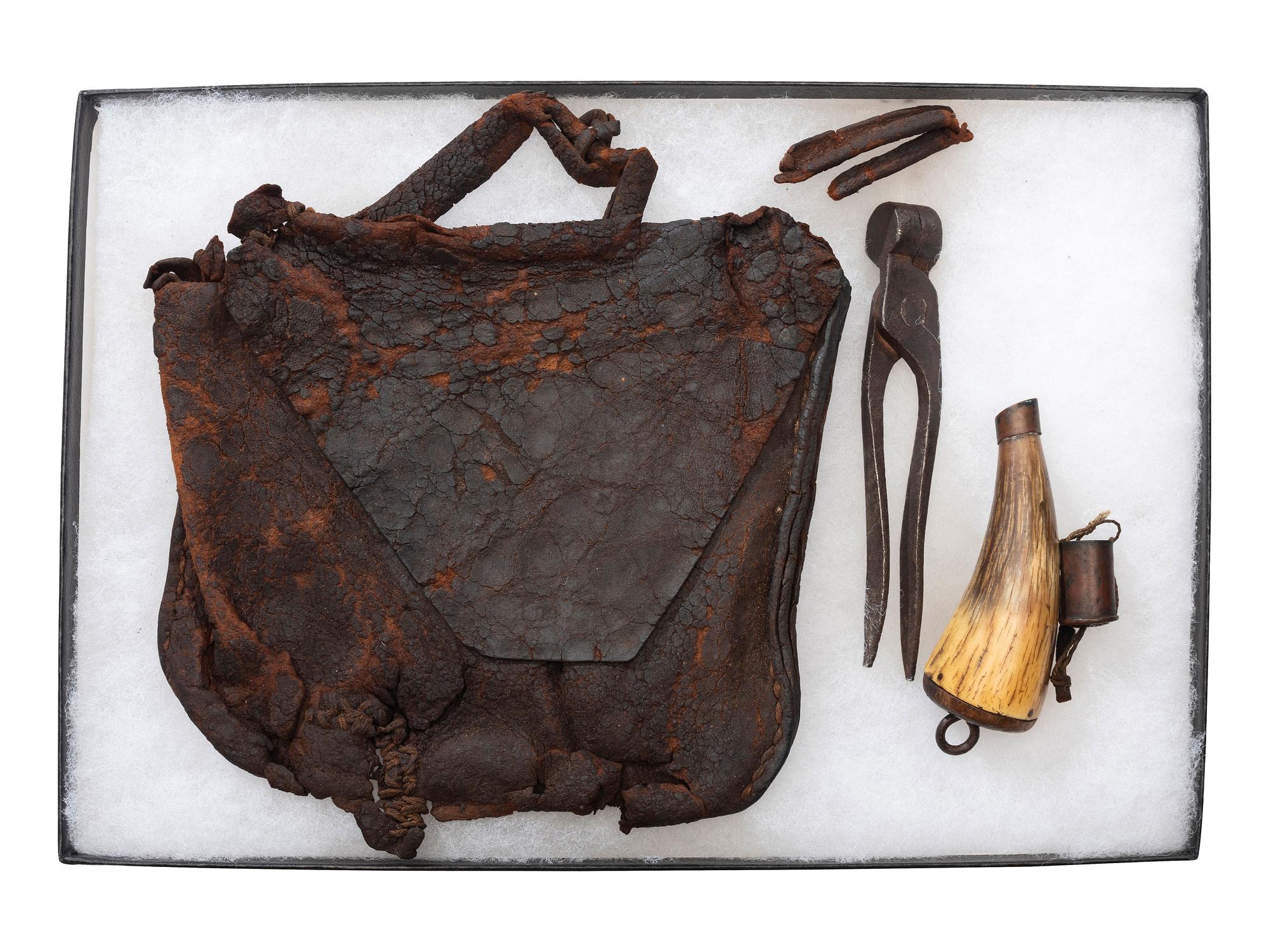 [HUNTING]. A group of 18th-early 19th-century hunting bags and powder horns.