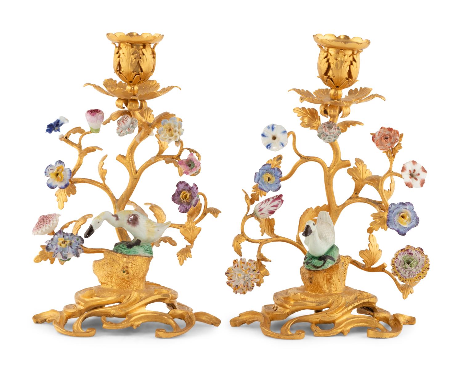 A Pair of French Gilt Bronze and Porcelain Candlesticks