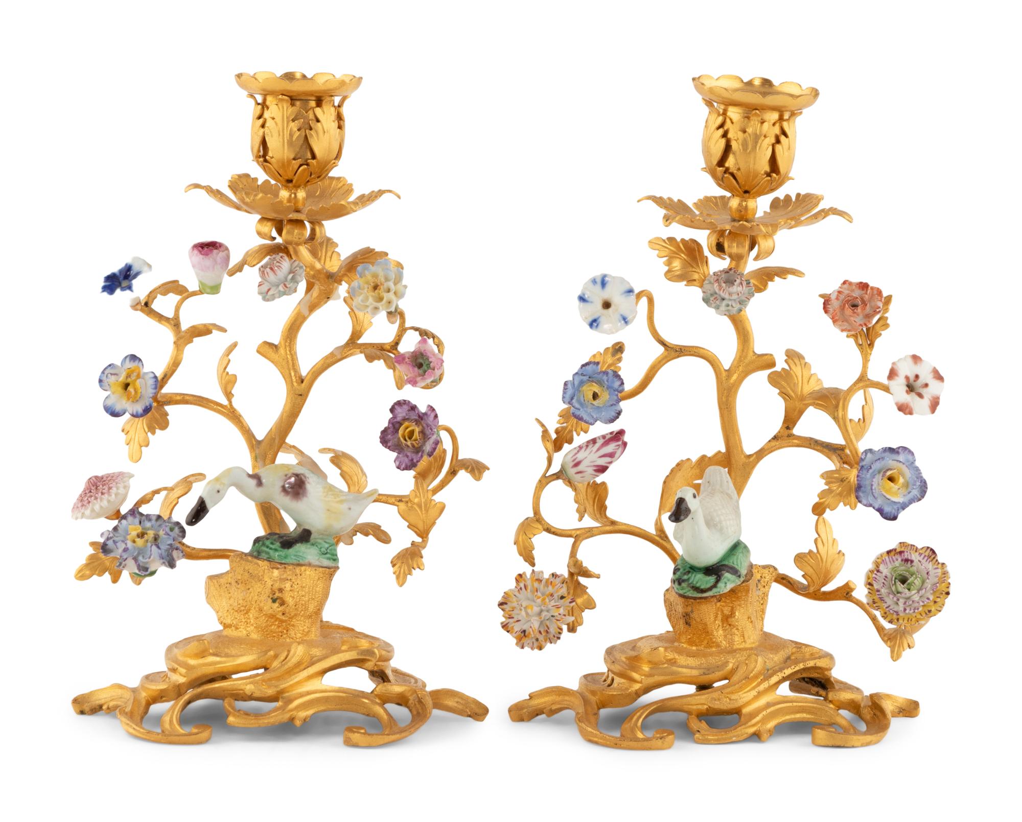 A Pair of French Gilt Bronze and Porcelain Candlesticks
