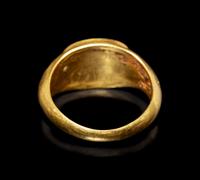 A Roman Gold and Garnet Finger Ring with the Goddesses Athena and Nike