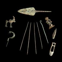 Eleven Luristan Bronze Figures and Implements